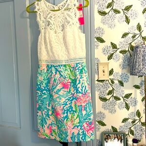 Lilly Pulitzer size 0 sleeveless dress. Lace top, multi colored bottom.